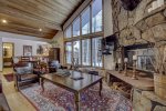 Living Room features wood burning fire place and mountain views